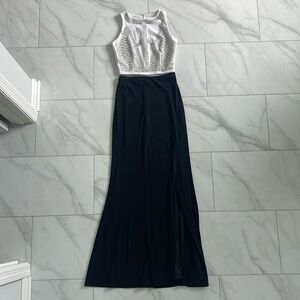 2 piece set with cropped beaded top and long black skirt with high leg slit